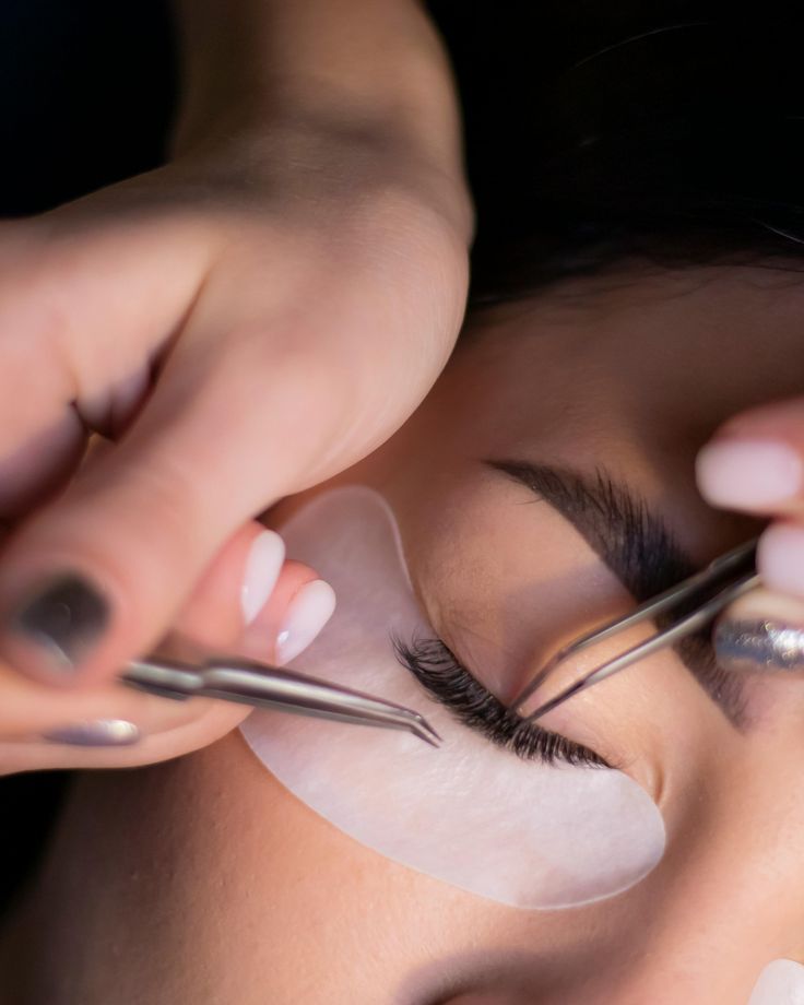 Gentle close-up of eyes before and after extension — natural lighting, minimal makeup.